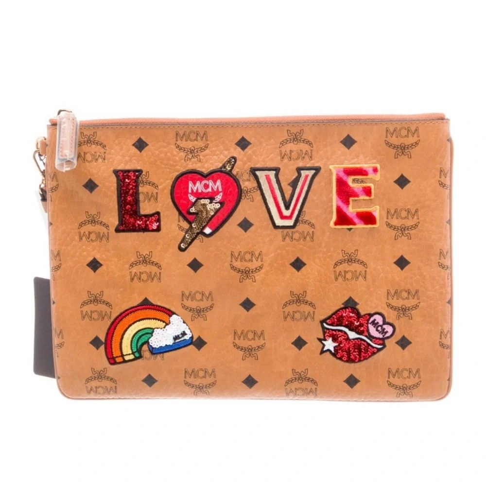 MCM• Leather Visetos Love Patch Wristlet Pouch •EUC - Picture 1 of 6
